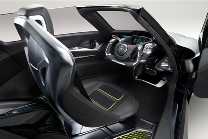 Drivers sit in the center with two passengers behind them Drivers sit in the center with two passengers behind them