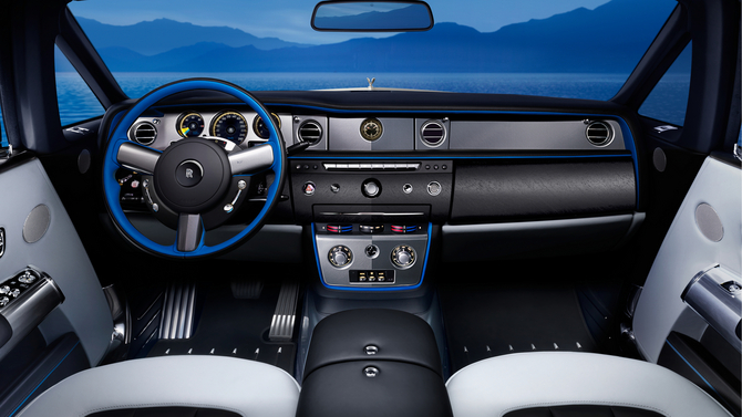 The design also extends to the steering wheel, which features blue accents combined with black leather