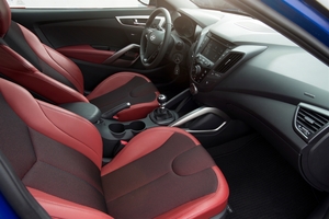 The interior gets leatherette seats to replace the leather of the standard car.