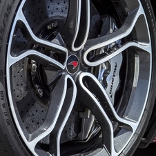 The wheels have a diamond-cut finish with chrome highlights and black details