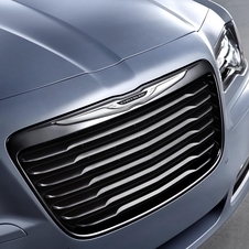 The grill is finished in dark chrome with a lighter chrome Chrysler badge