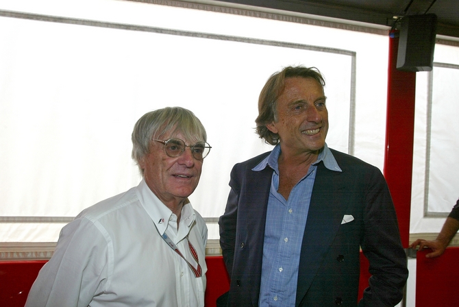 Ecclestone posing with Ferrari boss Luca di Montezemolo