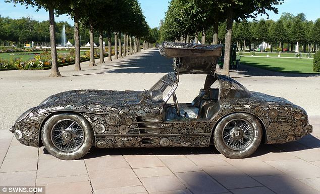 Trio builds Mercedes 300 SLR from scrap metal