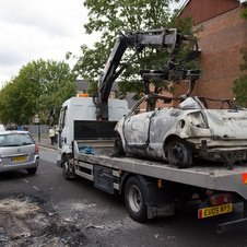 Cars being destroyed with London riots