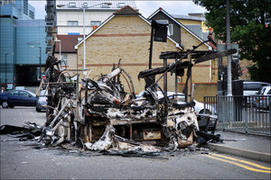 Cars being destroyed with London riots