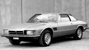 In the 80s, De Tomaso created the Longchamp with a front-mounted Ford V8