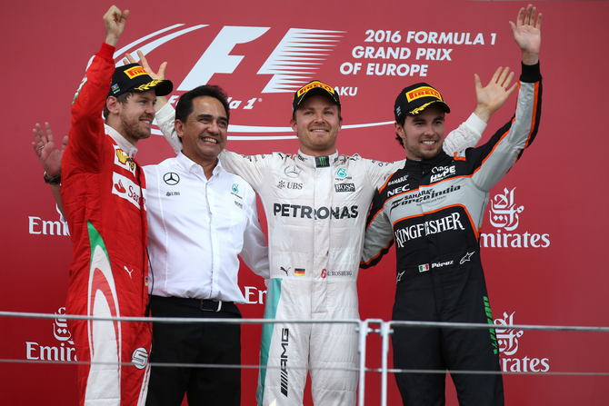 Sebastian Vettel and Sergio Pérez joined Rosberg on the podium