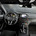The interior has a large rear-facing camera that shows the driver the cars behind him