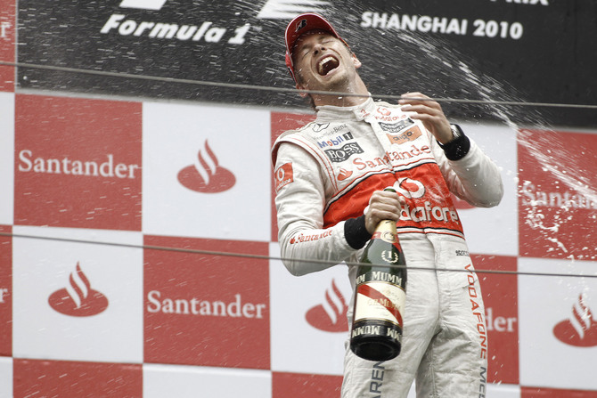 Button wins and takes the lead Button wins and takes the lead