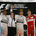 Lewis Hamilton and Kimi Raikkonen climbed to the podium alongside Nico Rosberg