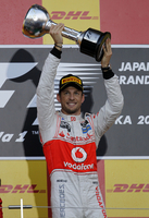 Vettel world champion in Button win