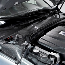 The plenum cover alone weighs 50% less than the conventional car