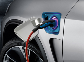 The plug-in is just in front of the driver's door