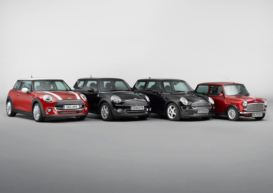 All of the generations of the modern Mini together with an older one