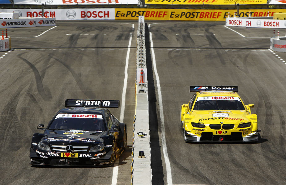Gary Paffett and Dirk Werner Racing in the third place race in the Munich Olympic Stadium.