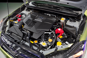 The electric motor is located between the engine and transmission