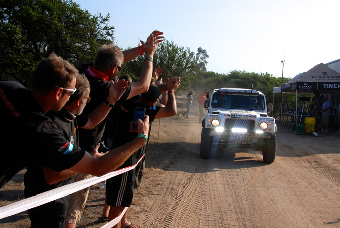 The team ran multiple vehicles in the rally The team ran multiple vehicles in the rally