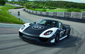 The electric motors are mounted on the front axle to drive the front wheels and driveline for the rear wheels