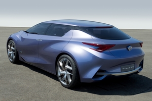 The car has a short fastback rear and long roof