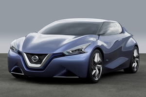 The V-shaped grill is carried all the way to the corners with the hood creases