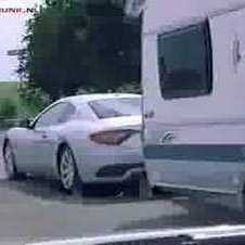 Maserati Gran Turismo pulling caravan